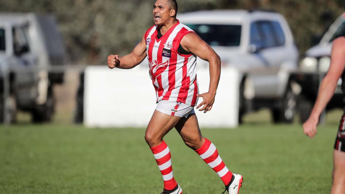 STAR SIGNING: Damian Cupido celebrates a goal at Henty in the Hume League. He has signed at Mangoplah-Cookardinia United-Eastlakes for the shortened season. Picture: The Border Mail