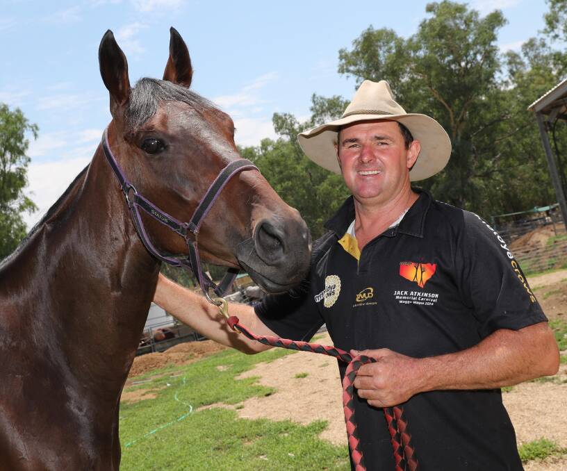 Wagga trainer Trevor Sutherland with Run Hoff Run, who will race at Murrumbidgee Turf Club on Saturday. Picture: Les Smith