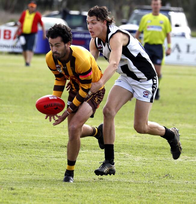 LEADING FROM THE FRONT: East Wagga-Kooringal captain Brocke Argus grabs the footy in the game against The Rock-Yerong Creek at Gumly Oval earlier this month. Picture: Les Smith