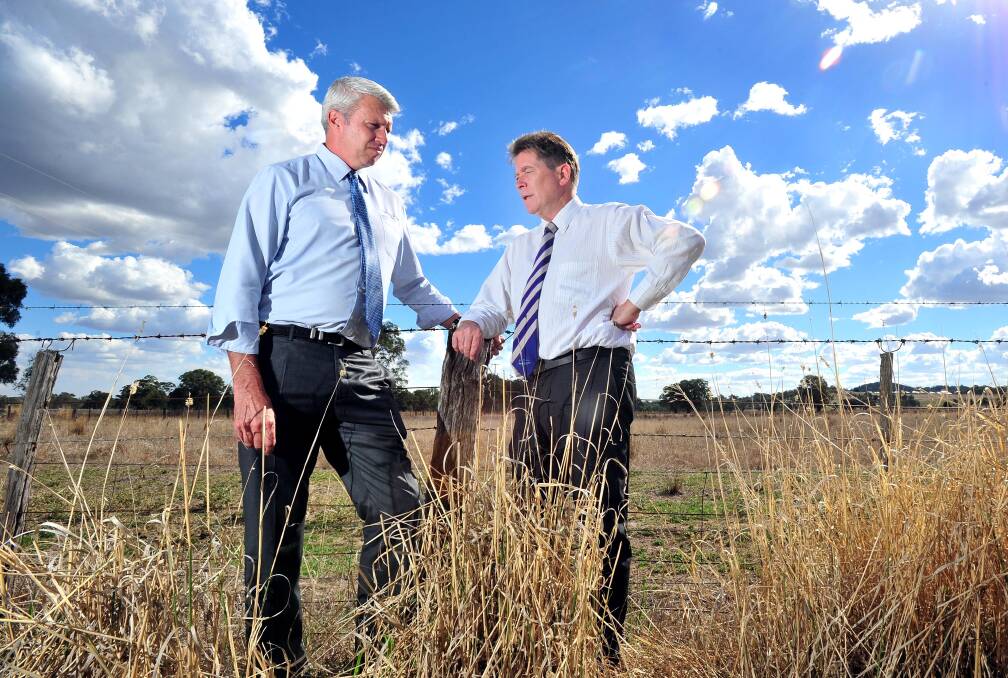 Graeme White and Harness Racing NSW chief executive John Dumnesy at the Cartwrights Hill land that Riverina Paceway was built.