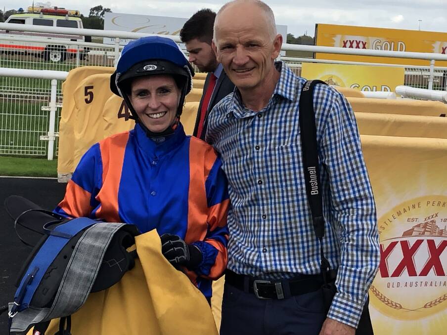 JOB DONE: Rebeka Prest and Tim Donnelly are all smiles after Pressed For Thyme's victory on Wagga Town Plate day. Picture: Matt Malone