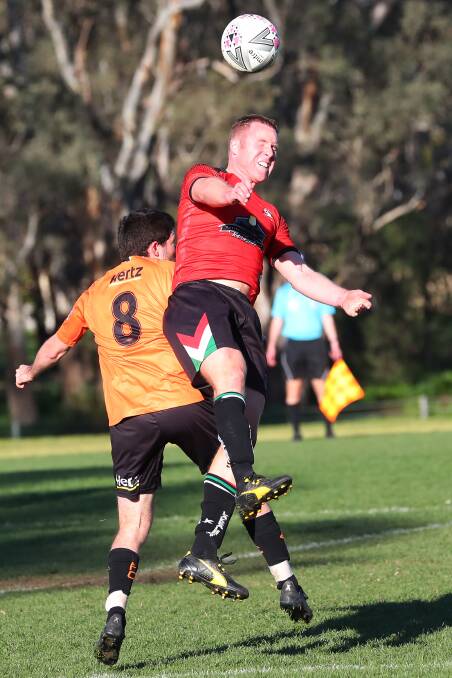Duncan Brodie gets his head to the ball against Wagga United last Sunday. Picture: Emma Hillier
