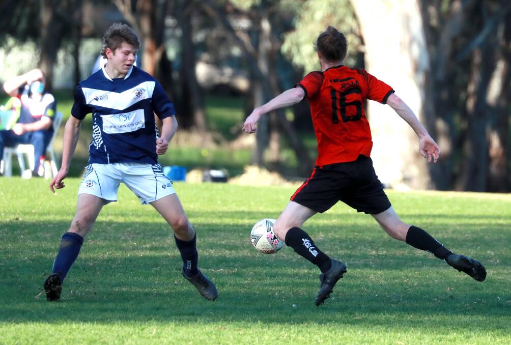 LAST TIME THEY MET: Young's Patrick Hislop and Lake Albert's Connor Hinchcliffe compete during the last Football Wagga round earlier this month. Picture: Les Smith
