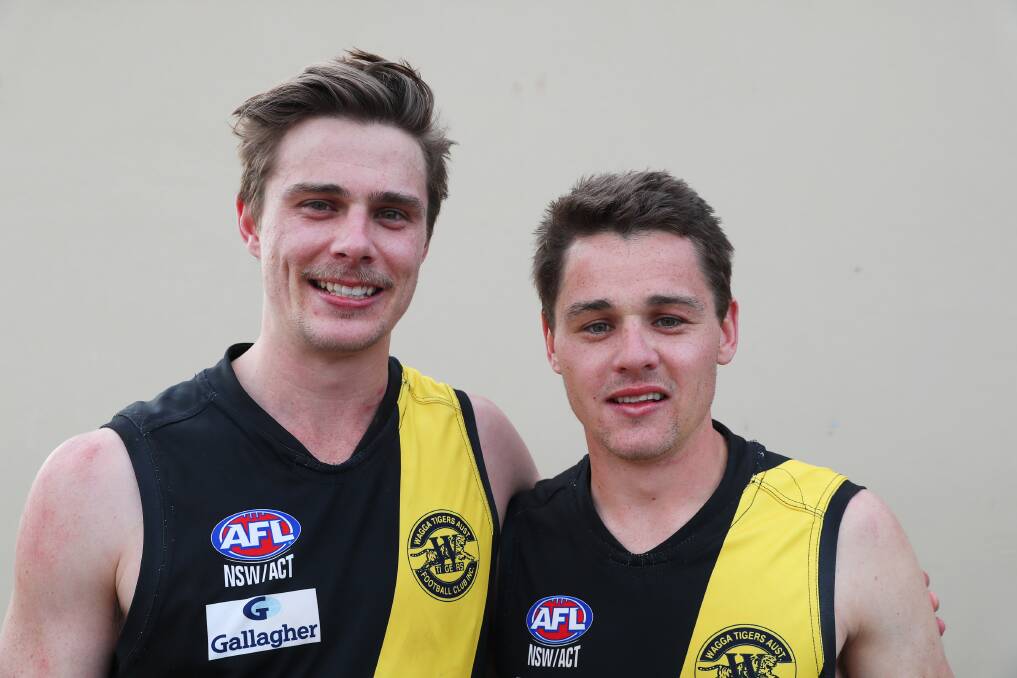 FAMILY AFFAIR: Sam and Nick Ryan are all smiles after Sunday's preliminary final win over Coolamon. Picture: Emma Hillier