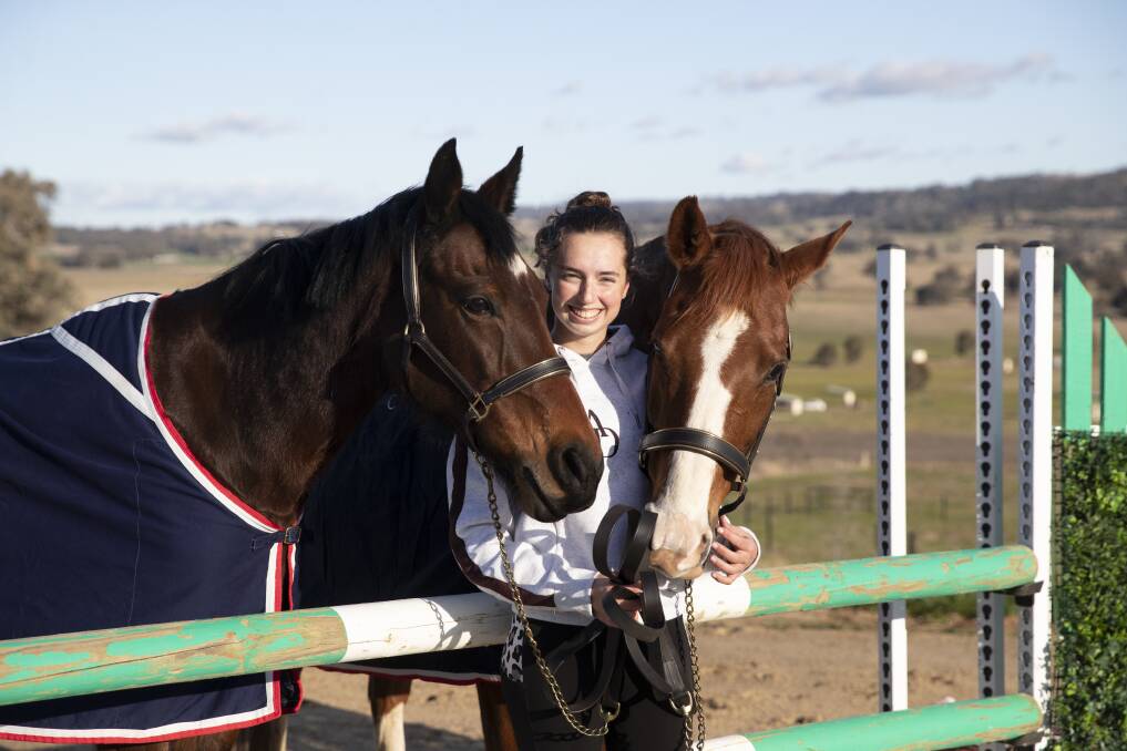 STATE SELECTION: Indianna Cornius-Randall with horses Miranda and Spider at their home in Gregadoo as they prepare for the Australian Interschool Championships. Picture: Madeline Begley