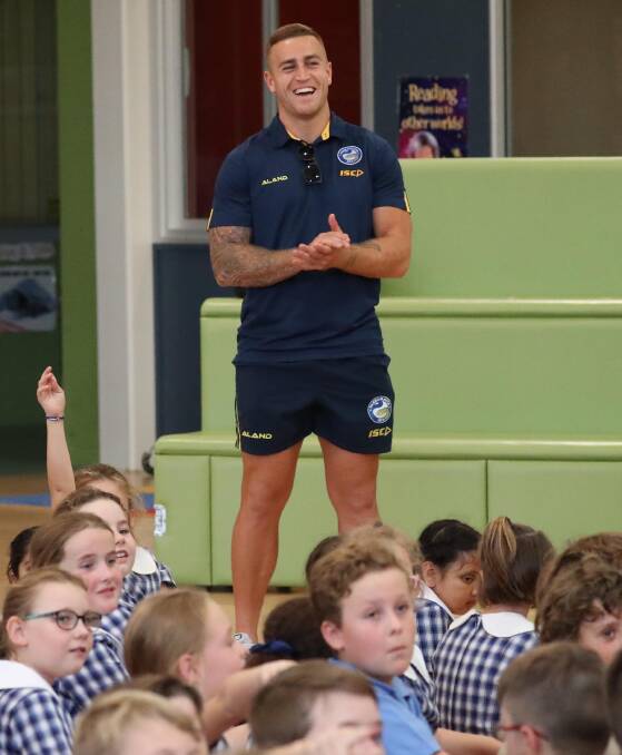 Cameron King back at his old school, Sacred Heart Primary School, in Wagga last year. Picture: Les Smith