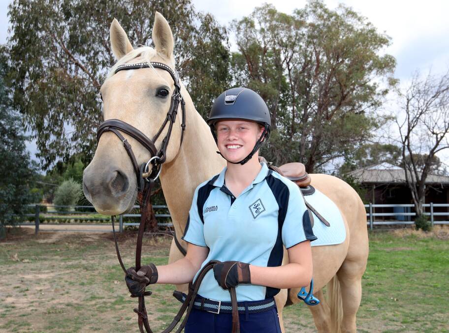 EXCITING TIMES: Wagga teenager Ryleigh O'Hare with her 11-year-old showjumper, Navahome Bono, ahead of their trip to Sydney this week. Picture: Les Smith