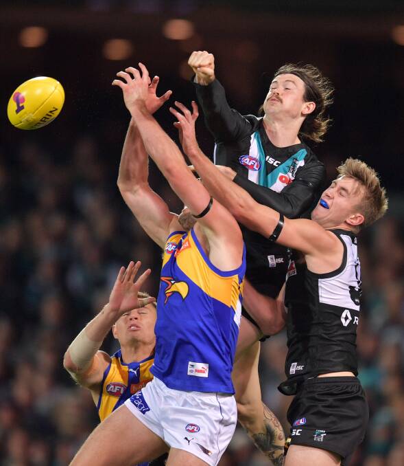 Dougal Howard (right) in action during Saturday night's final against West Coast at Adelaide Oval. Picture: AAP