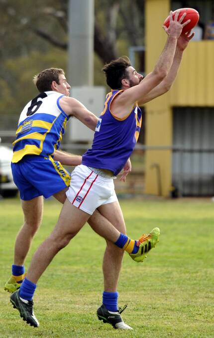 HANDY INCLUSION: Mitch Gorman taking a mark for Narrandera back in 2015. He has signed with Barellan for the remainder of the Farrer League season. Picture: Les Smith