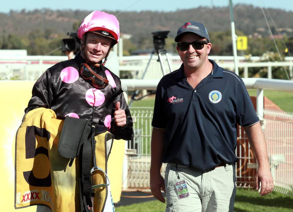 HAPPY DAYS: Border pair Blaike McDougall and Craig Widdison discuss the win of Ruby Skye in the Tom Patton Cup on Friday. Picture: Les Smith