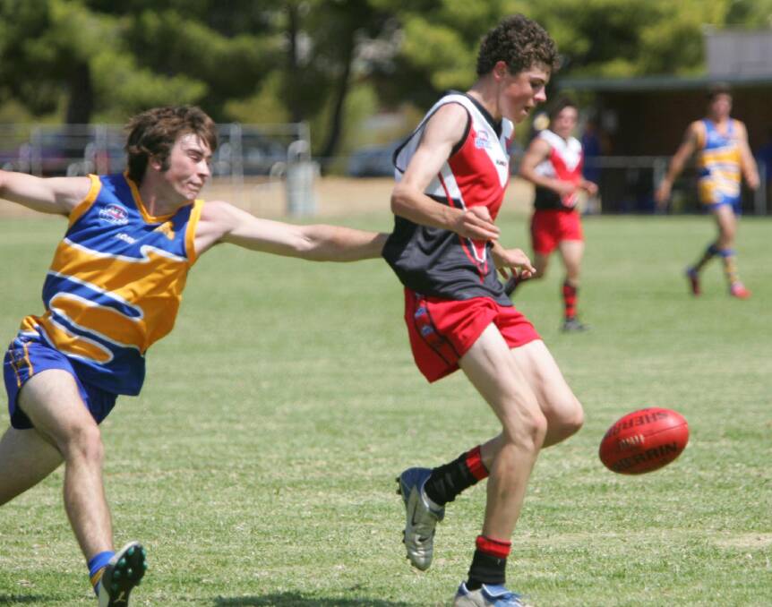 A young Isaac Smith in action at Maher Oval in Wagga in 2006.