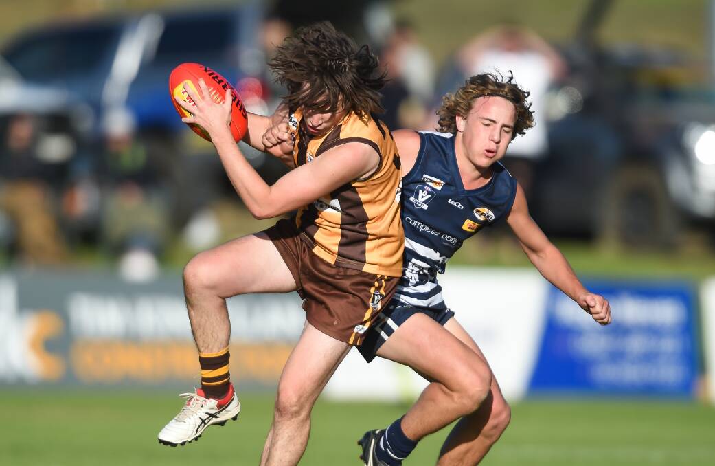 Jed Griffin (right) in action for Rutherglen last season. Picture: The Border Mail