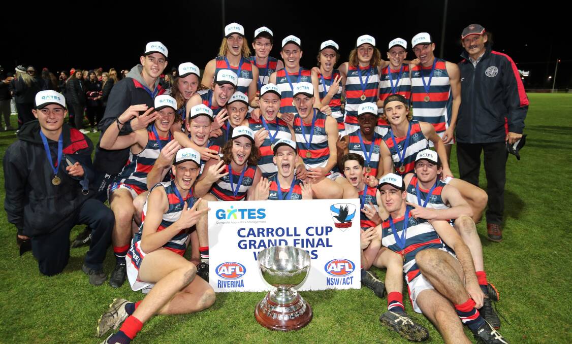 CHAMPIONS: Kildare Catholic College celebrate their Carroll Cup win at Robertson Oval on Wednesday night. Picture: Les Smith