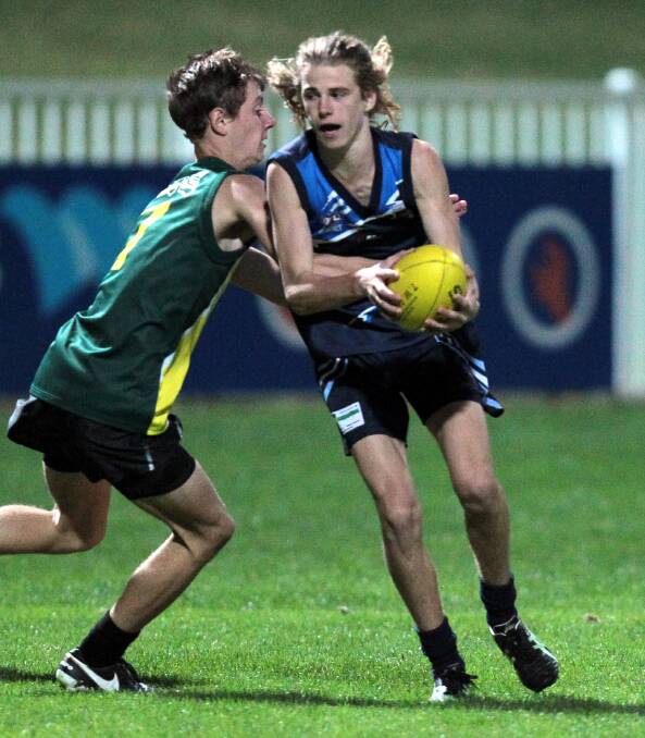 BIG CHALLENGE: Wagga High captain Sam McGowan involved in a Carroll Cup game in recent years. McGowan will be one of the key men for Wagga High in Wednesday night's semi-final.