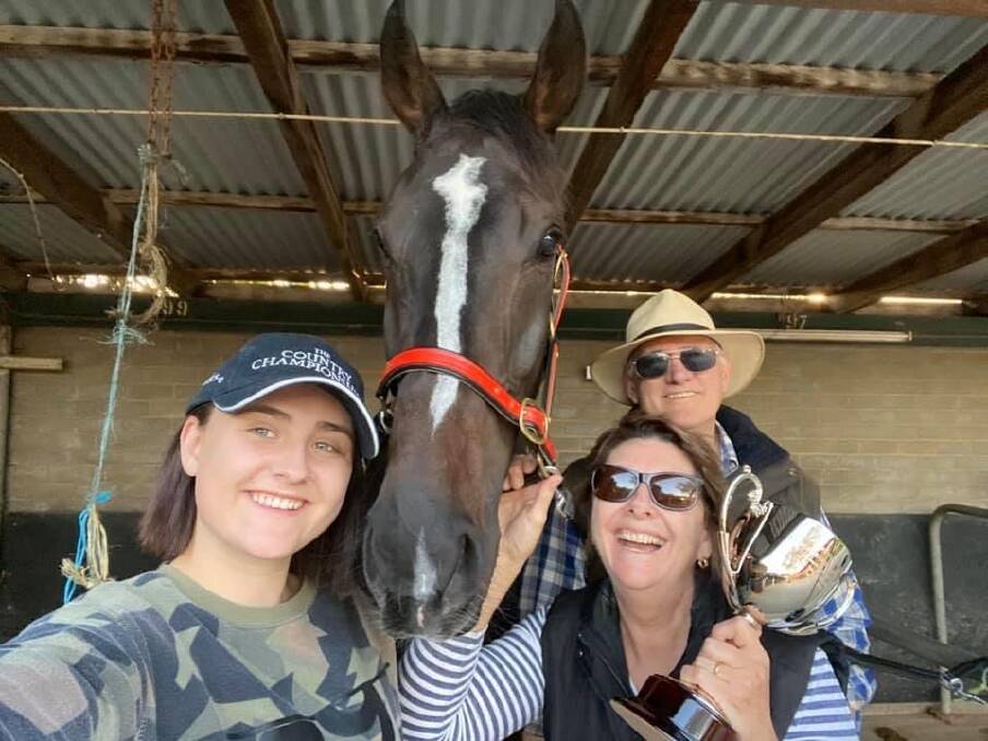 WINNERS ARE GRINNERS: Faith Collins, John Whitelaw and Vicki Whitelaw
celebrate the Murrumbidgee Cup win of The Doctor's Son at Wagga on Sunday. Picture: John Whitelaw Racing