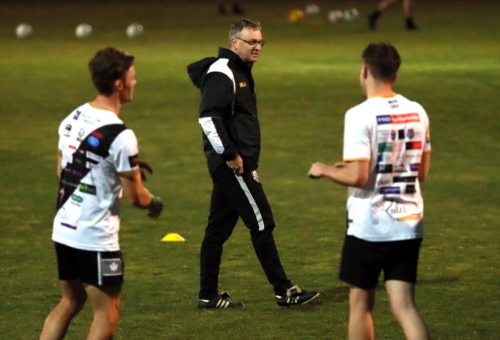 FINAL TOUCHES: Wagga City Wanderers coach Michael Babic at the club's final training session at Gissing Oval on Thursday night. Pictures: Les Smith