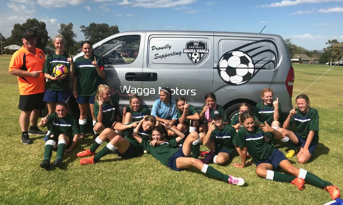 NUMBER ONE: The Riverina Anglican College's (TRAC) under 15 girls team celebrate their winning day at the Bill Turner Trophy on Monday. 