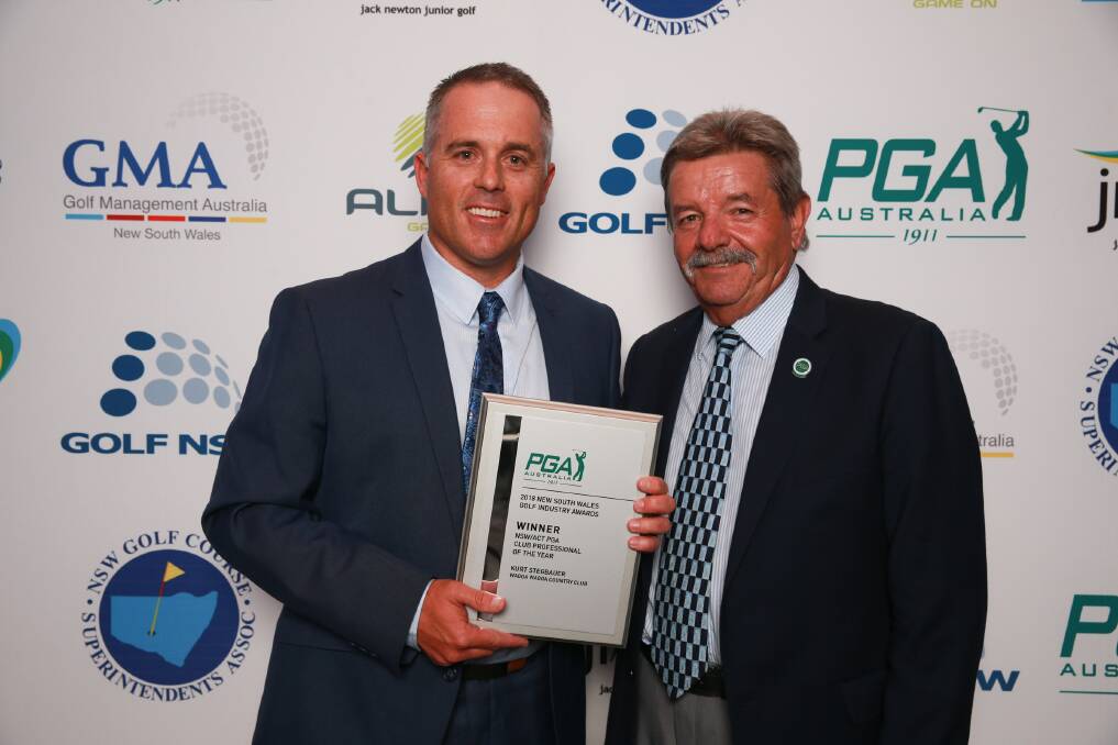 RECOGNITION: Wagga Country Club professional Kurt Stegbauer receives his award from PGA chairman Rodger Davis on Monday night. Picture: Golf NSW