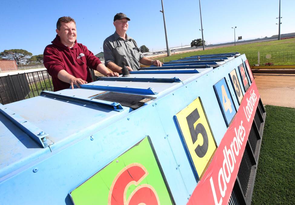 POSITIVE NEWS: Wagga and District Greyhound Racing Club racing manager John Patton with course curator Adrian Podmore ahead of this year's Gold Cup. Picture: Les Smith