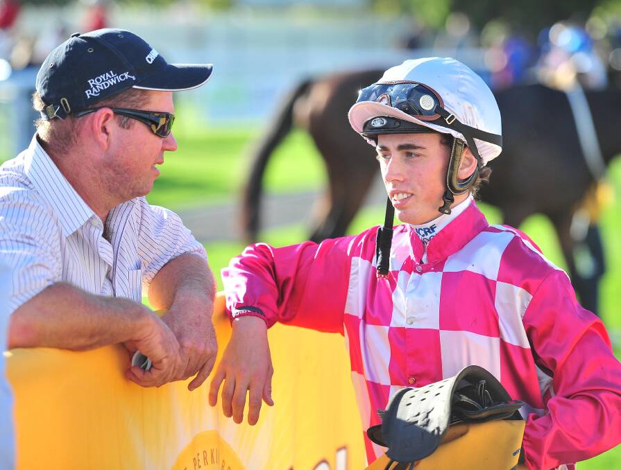 EXCITING TIMES: Canberra trainer Steven O'Brien with Victorian apprentice Lachlan King after Rose's Song's Murrumbidgee Cup win on Sunday. Pictures: Kieren L Tilly