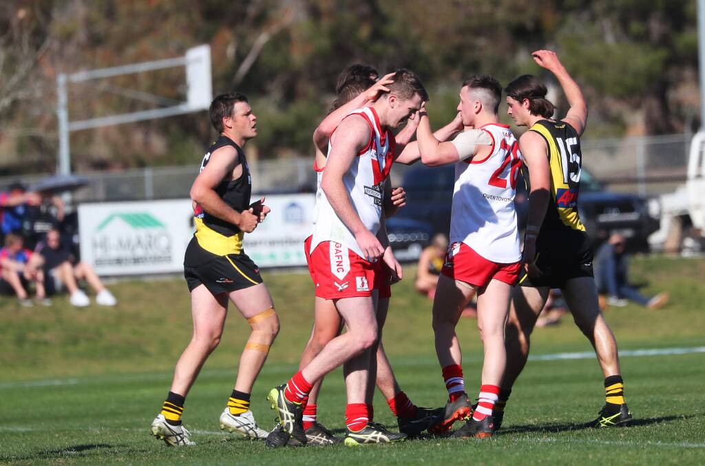 BACK HOME: Jacob and Lucas Conlan celebrate a goal against Wagga Tigers during last year's finals series. Picture: Emma Hillier