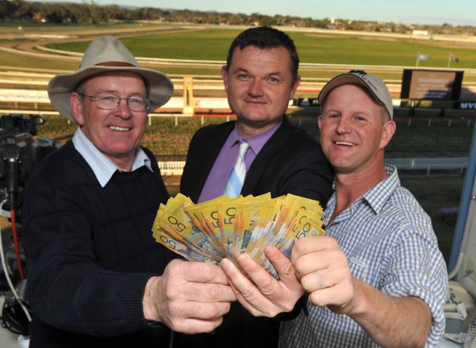 Murrumbidgee Turf Club chief executive Scott Sanbrook (middle) launching a new initiative with Wagga trainers Wayne Carroll and Chris Heywood in 2014.