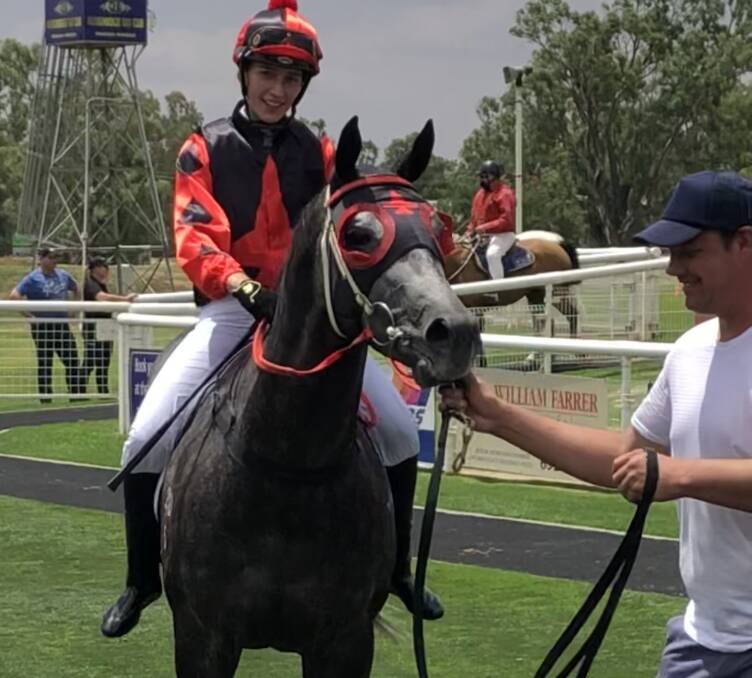SPECIAL MOMENT: Wodonga trainer Heath Maclean welcomes back Hannah Williams on Mythical Goddess after winning at Wagga on Saturday. Picture: Matt Malone
