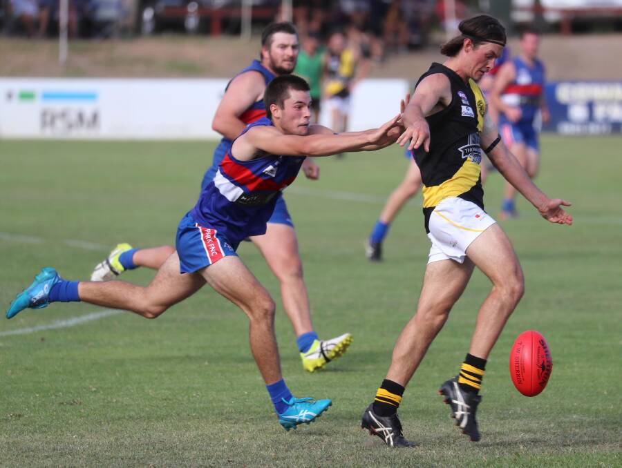 Reid Gordon (right) in action for Wagga Tigers.