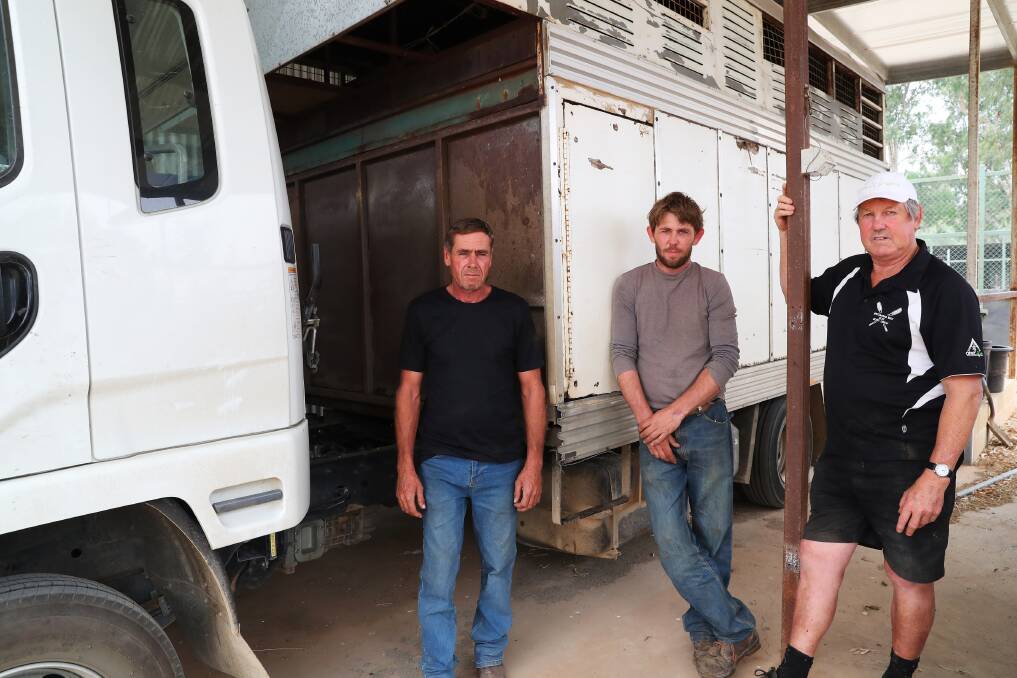 TEAM EFFORT: Tumbarumba trainer Graham Byatt, Simon Grimson and Wagga trainer Gary Colvin with his truck that was used to help save 25 horses from the bushfires. Picture: Emma Hillier