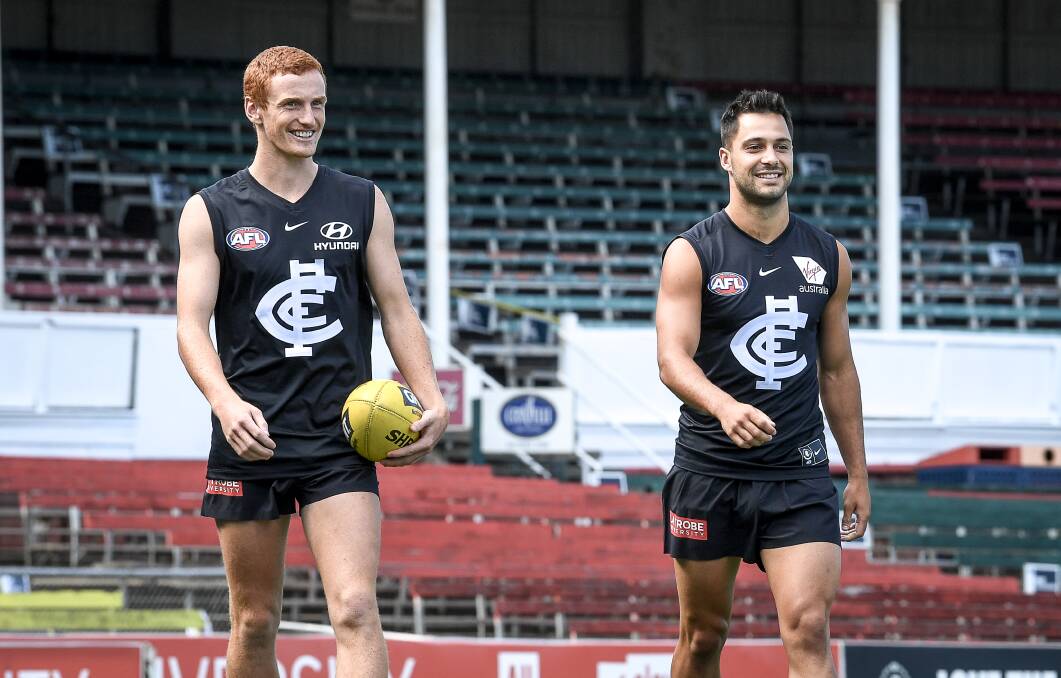 ALL SMILES: Coolamon's Mick Gibbons (right) has been selected to make his AFL debut against Richmond on Thursday night.