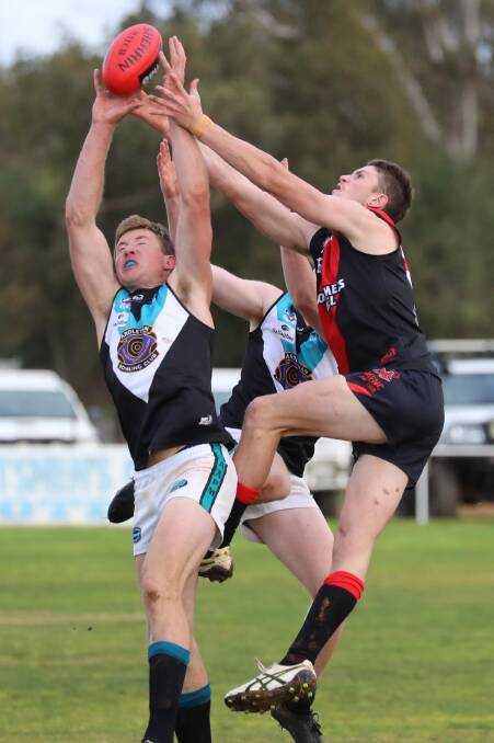 ON THE MOVE: Matt Parks (right) attempts to take a mark for Marrar against Northern Jets last season. Parks has signed with Riverina League club Collingullie-Glenfield Park. Picture: Les Smith