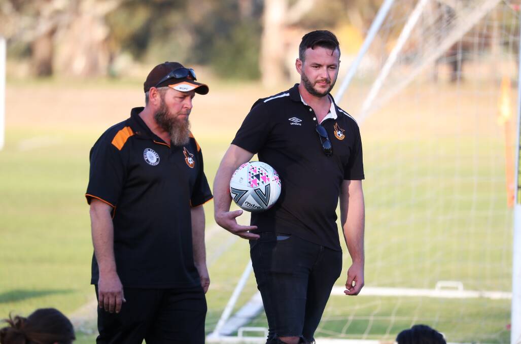 Outgoing Wagga United co-coaches Scott Rohrich and Aaron Mo'ane.