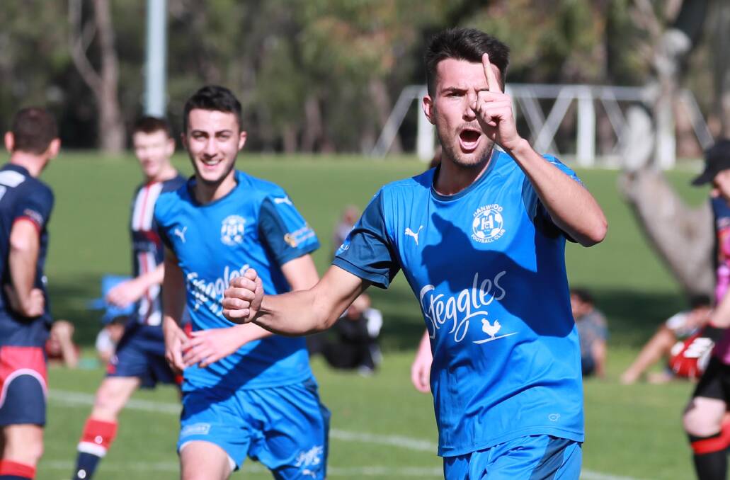 WE'RE NUMBER ONE: Hanwood striker Michael Cimador celebrates the opening goal of the Pascoe Cup preliminary final against Henwood Park at Rawlings Park on Sunday. Picture: Les Smith