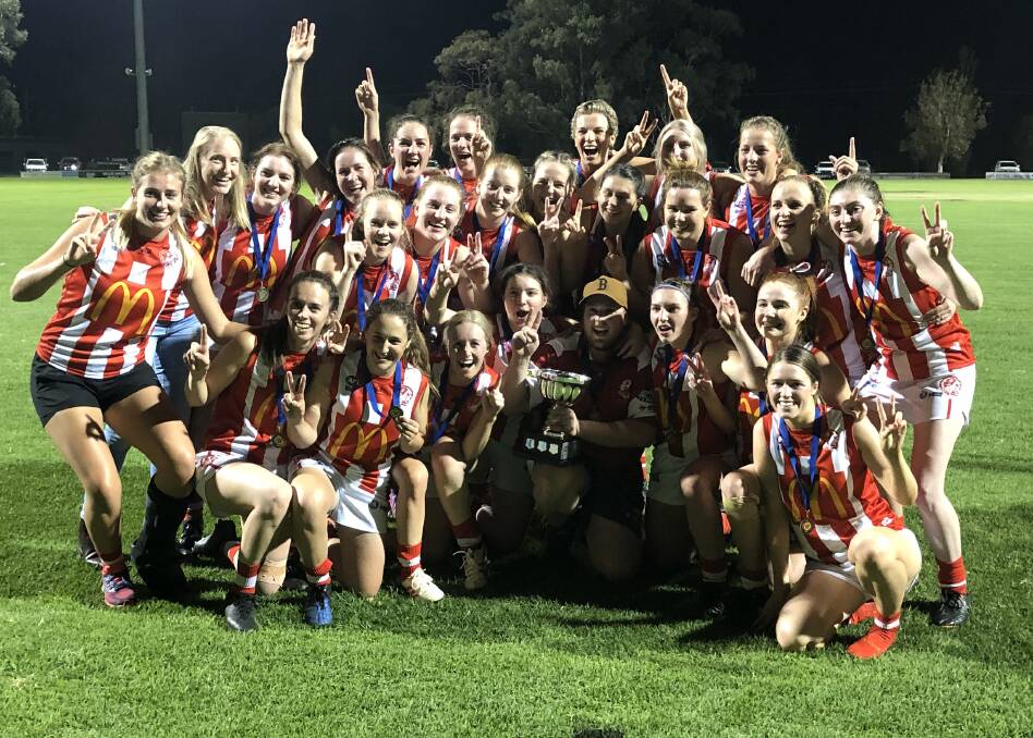 Charles Sturt University celebrate this year's grand final victory over Griffith. Picture: Liam Warren