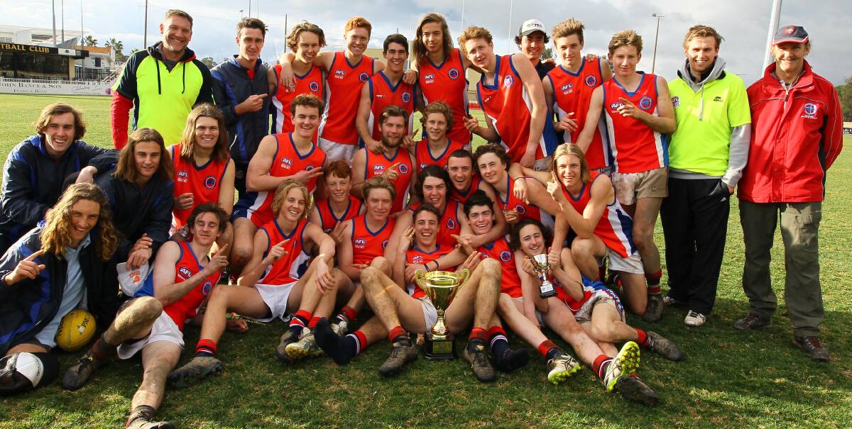 NUMBER ONE: Kildare Catholic College celebrate their state title at Robertson Oval on Wednesday. Picture: Les Smith