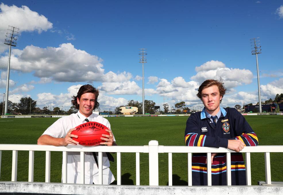 READY TO GO: The Riverina Anglican College captain Matt Hamblin and Mater Dei Catholic College counterpart Kyle Hockley at Robertson Oval on Tuesday. Picture: Emma Hillier