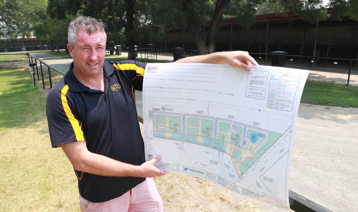 Murrumbidgee Turf Club chief executive Steve Keene with plans for the new stable complex.