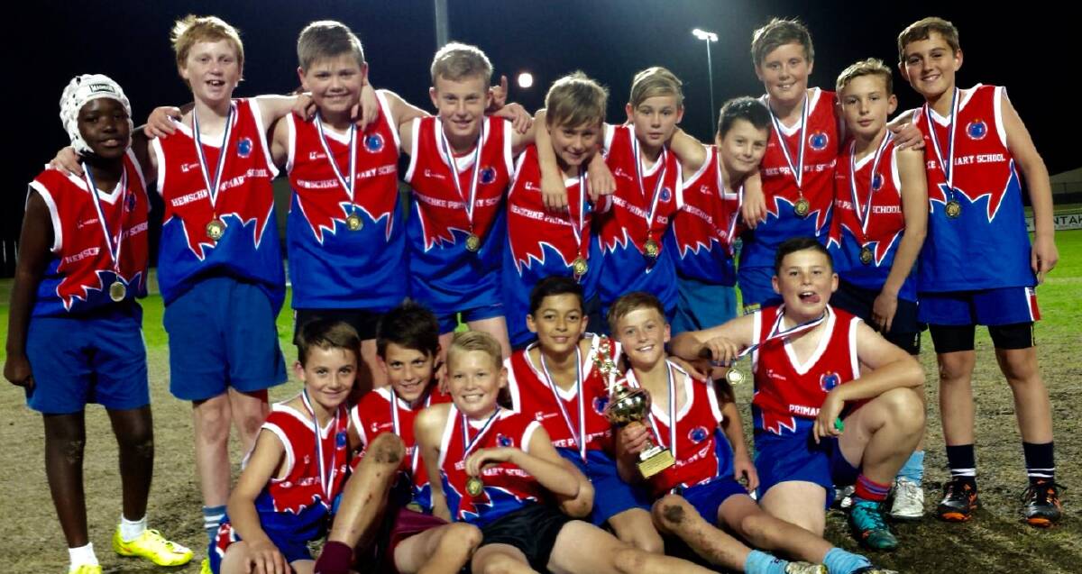 CHAMPIONS: Henschke Primary School enjoy their Paul Kelly Cup win over South Wagga Public School at Robertson Oval on Wednesday night.