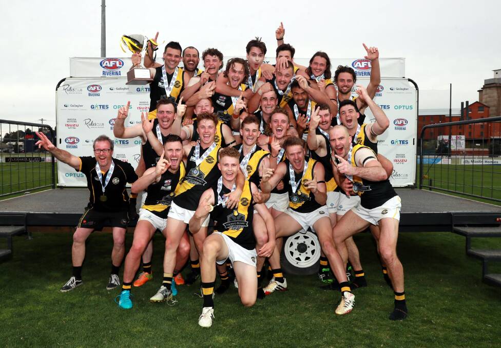 PREMIERS: Wagga Tigers celebrate the AFL Riverina Championship grand final victory at Robertson Oval on Saturday. Picture: Les Smith