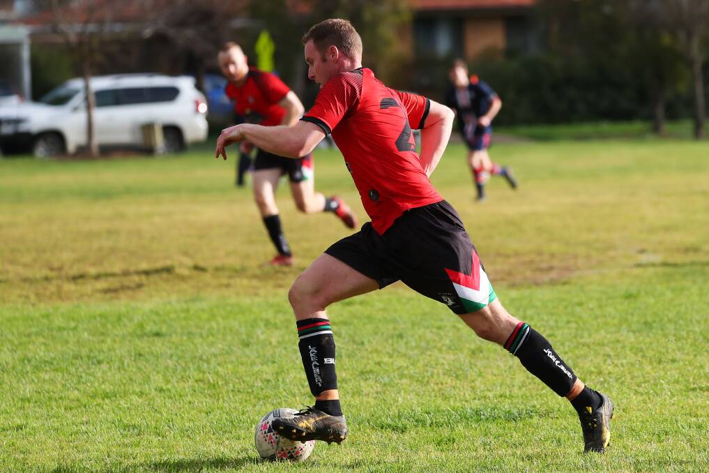 ON THE MARCH: Duncan Brodie takes the ball into attack for Lake Albert in the game against Henwood Park last month. Picture: Emma Hillier