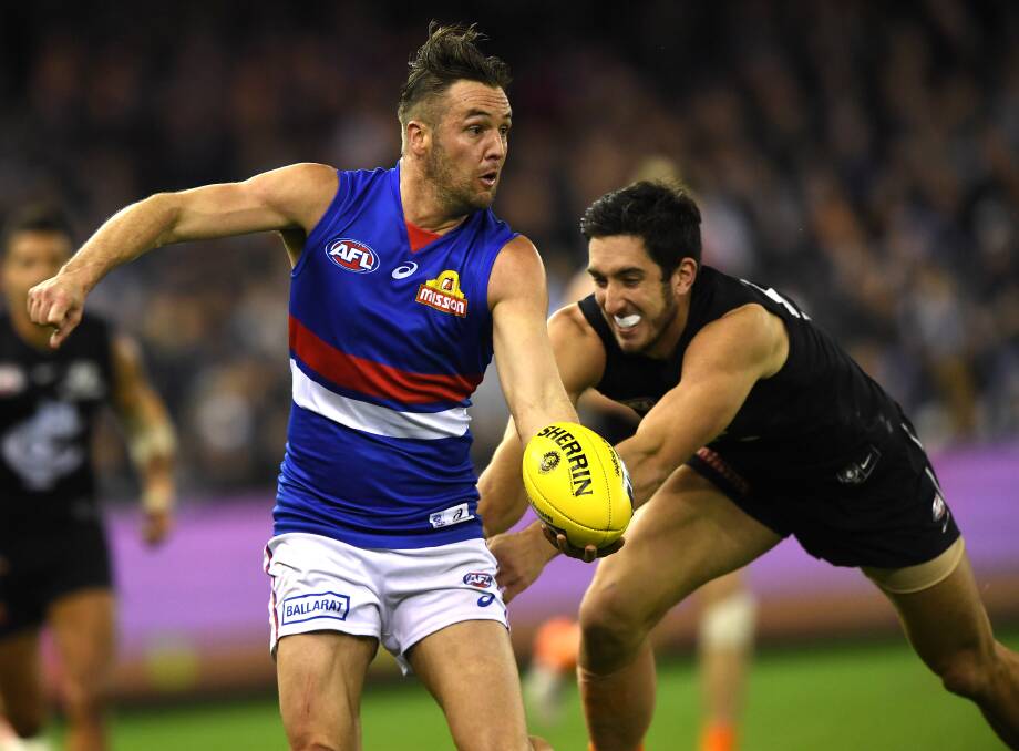 RE-SIGNED: Wagga's Matt Suckling in action for Western Bulldogs against Carlton this year. Picture: AAP