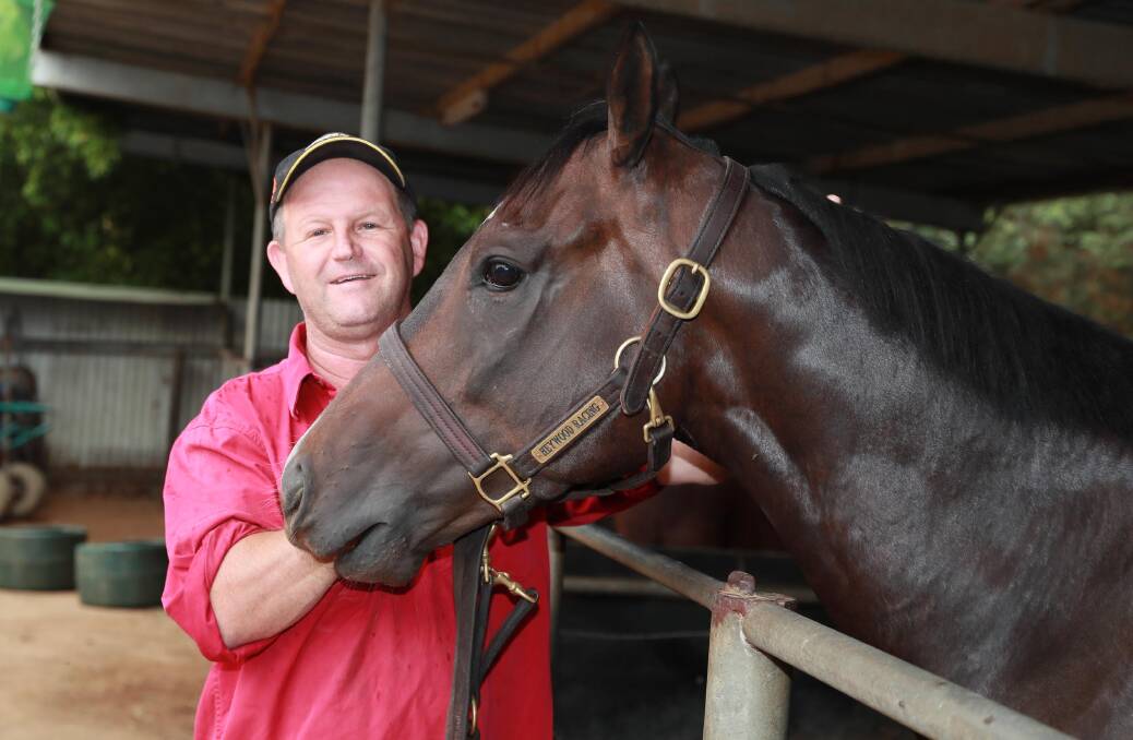 TOUGH TEST: Wagga trainer Chris Heywood with Blitzar at his stables on Thursday. Picture: Les Smith