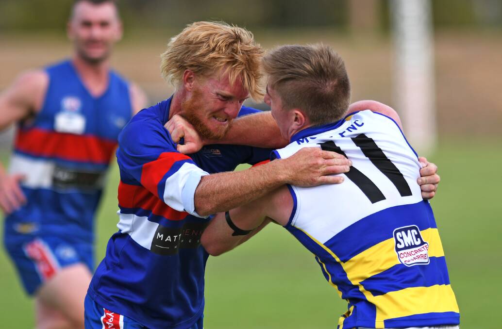 Turvey Park co-coach Jeremy Sykes in action against MCUE's  Lachlan Kendall last Saturday. 
