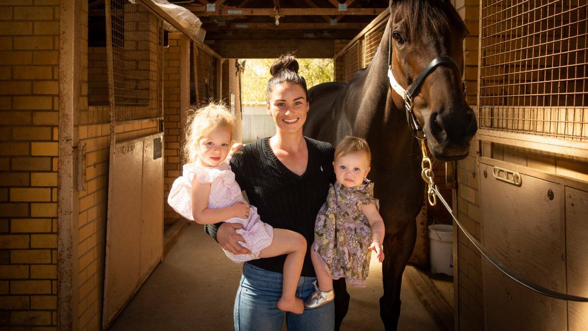 Danielle Scott with her two daughters Penelope, 3, and Maisie McDougall. Picture: Mark Jesser