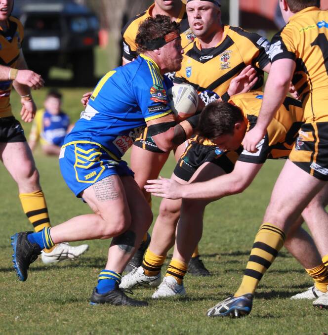 Hayden Cowled runs the ball up for Junee against Gundagai last Saturday. Picture: Les Smith