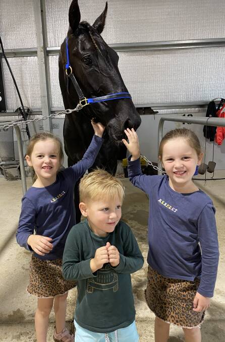 FAMILY AFFAIR: Milla, Cooper and Olivia Kahlefeldt with Muscle Factory at Riverina Paceway on Tuesday night.