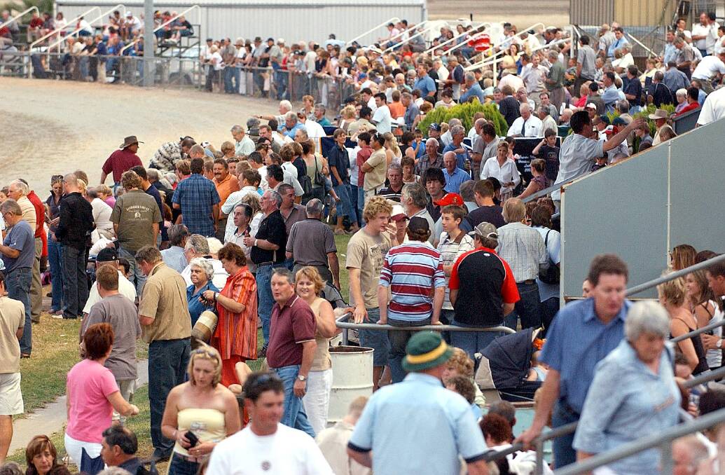 A FAN FAVOURITE: A section of the crowd at Lin Gordon Paceway at Leeton for the 2004 MIA Breeders Plate.
