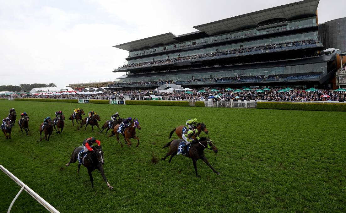 CLOSE CALL: Awesome Pluck (red and black) holds on for third place in the inaugural running of The Kosciuszko at Randwick last year. Picture: AAP
