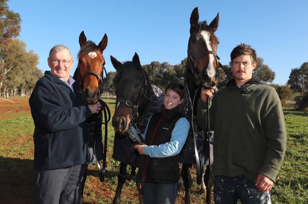 IN-FORM TEAM: Wayne Carroll with Fashion Tip, Belinda Wright with Rock 'N' Roller and Myles Carroll with Lady Mironton. Picture: Les Smith