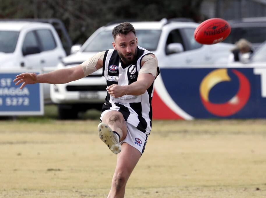 ON SONG: The Rock-Yerong Creek's Dean Biermann snaps a goal during the third quarter of the Farrer League game against North Wagga at McPherson Oval on Saturday. Picture: Les Smith